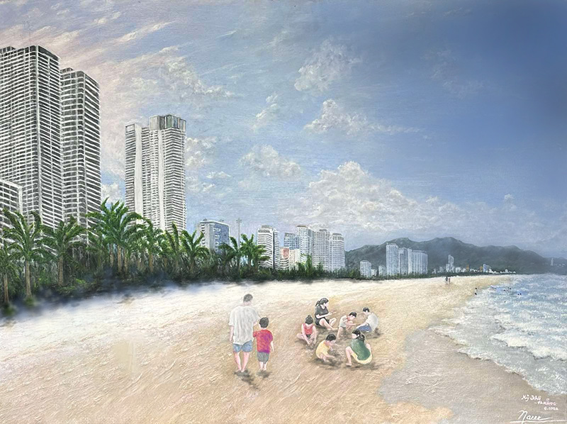 “Afternoon view of My Khe Beach, Da Nang—families on the shoreline with skyline and mountains in soft light.”